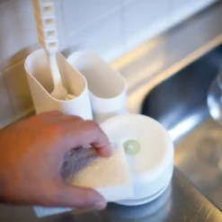 Dishwashing liquid pump with storage rack large, white