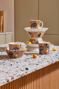 Stinky in action Moomin mug, Brown
